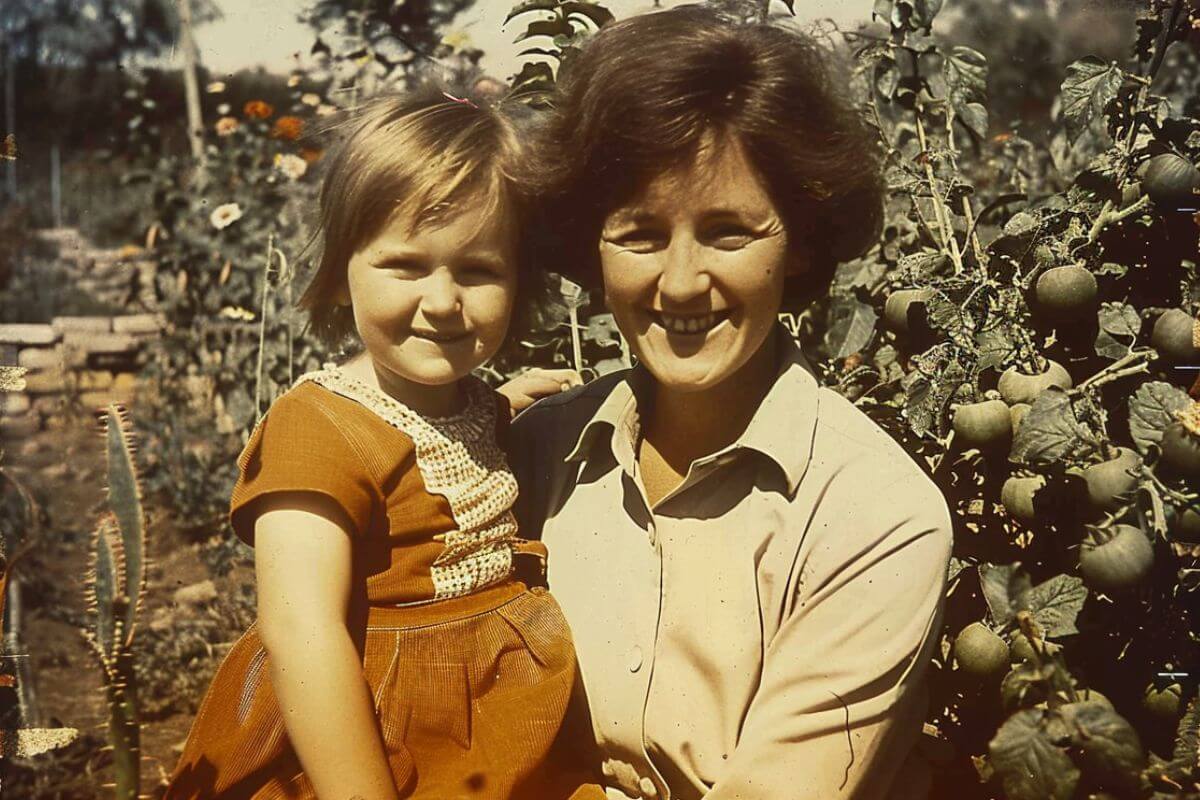 My grandmother Jenny holding me when I was still a young girl, the main reason why I love gardening.
