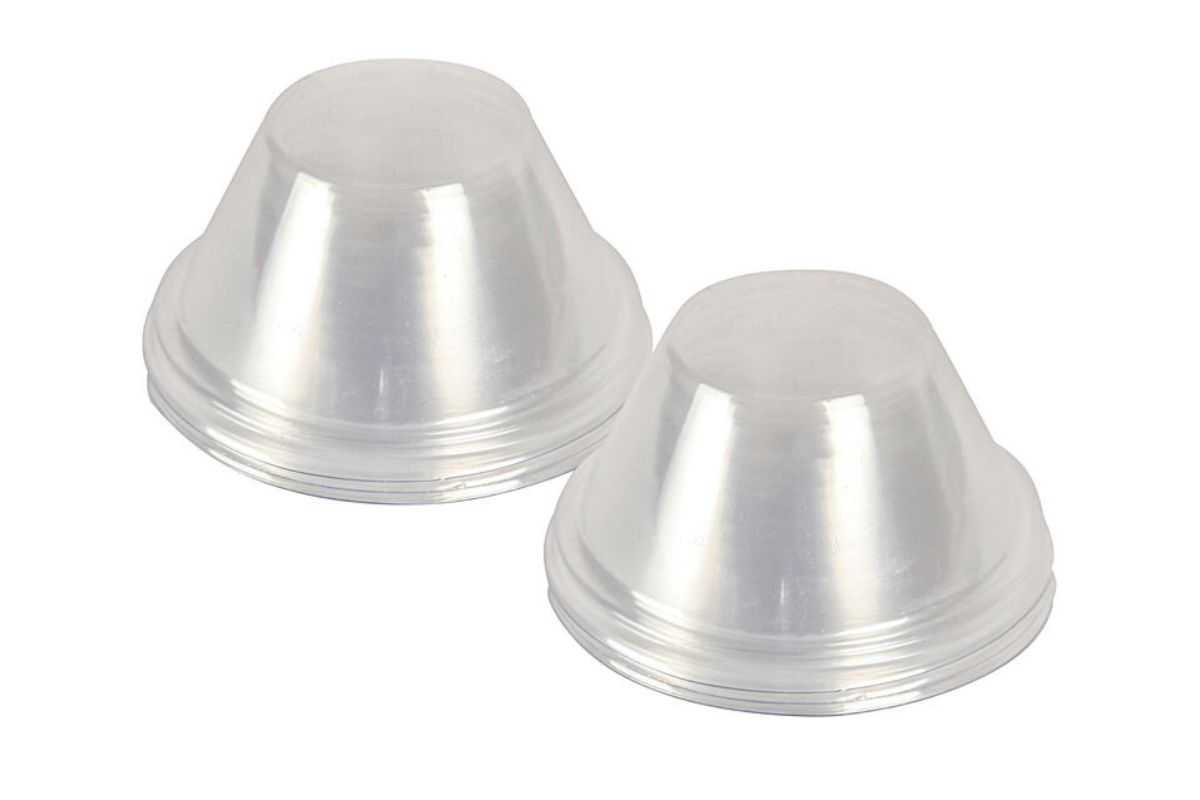 Two transparent plastic AeroGarden domes are displayed against a white background. The conical lids are positioned side by side.