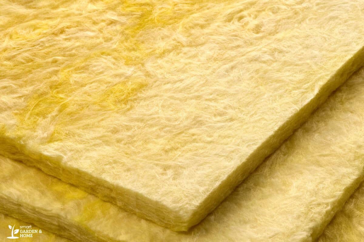 Close-up of three overlapping yellow hydroponic rockwool panels.